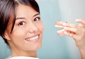 Woman with false teeth
